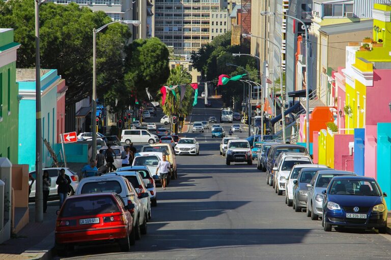 View down a colourful Bo-Kaap street towards the city