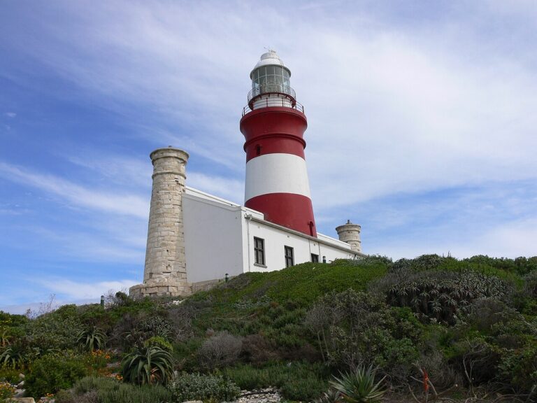 Cape Agulhas Lighthouse rising above its white buildings