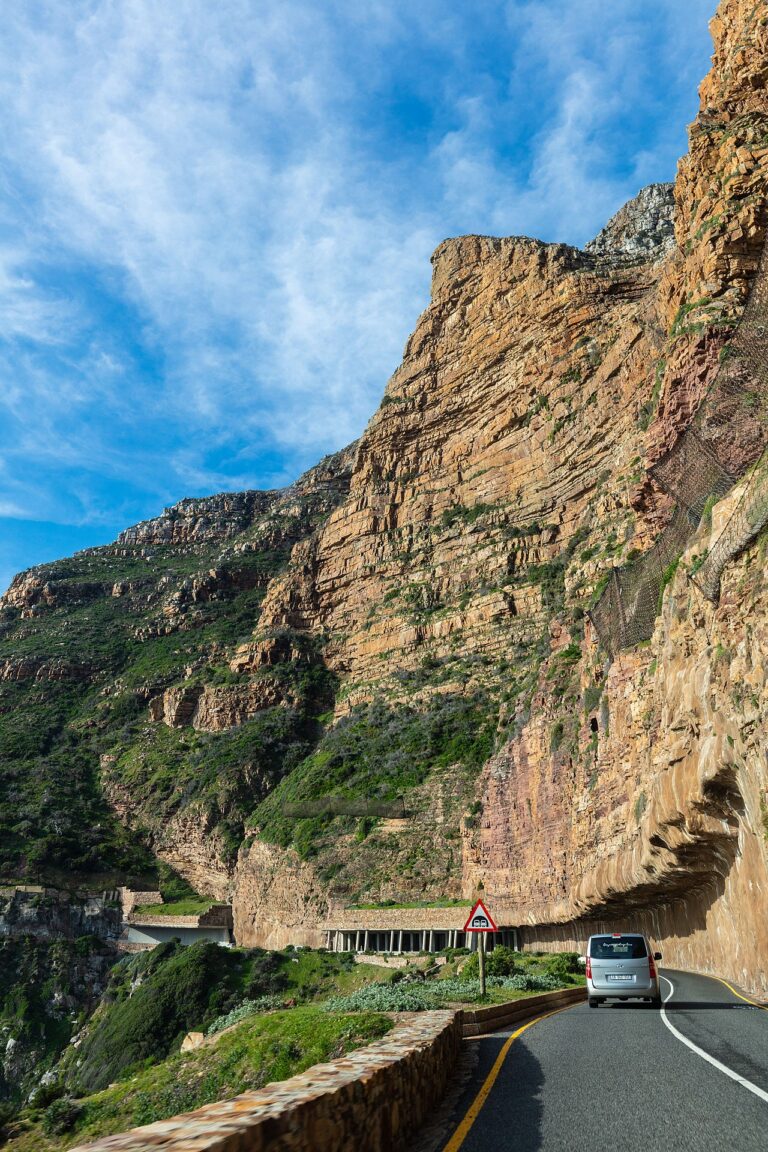 Chapman’s Peak road passing beneath a steep rock face
