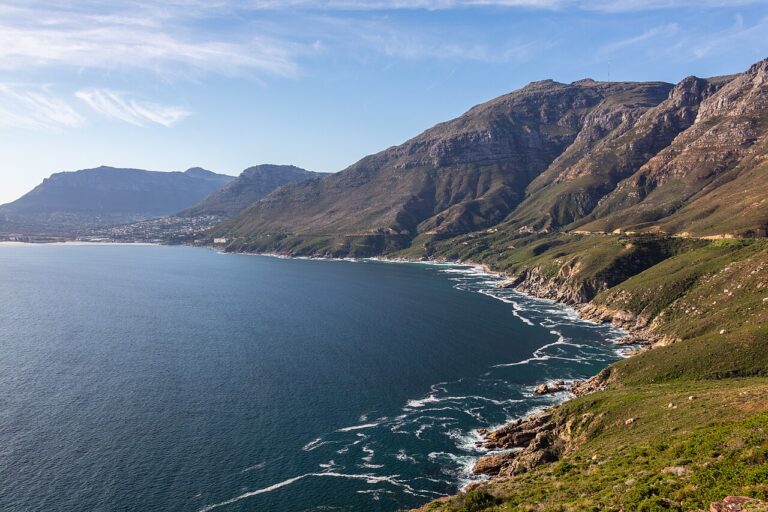 Mountain slopes curving around the bay beside Chapman’s Peak Drive
