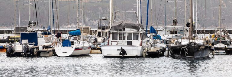 Yachts moored together in a sheltered marina