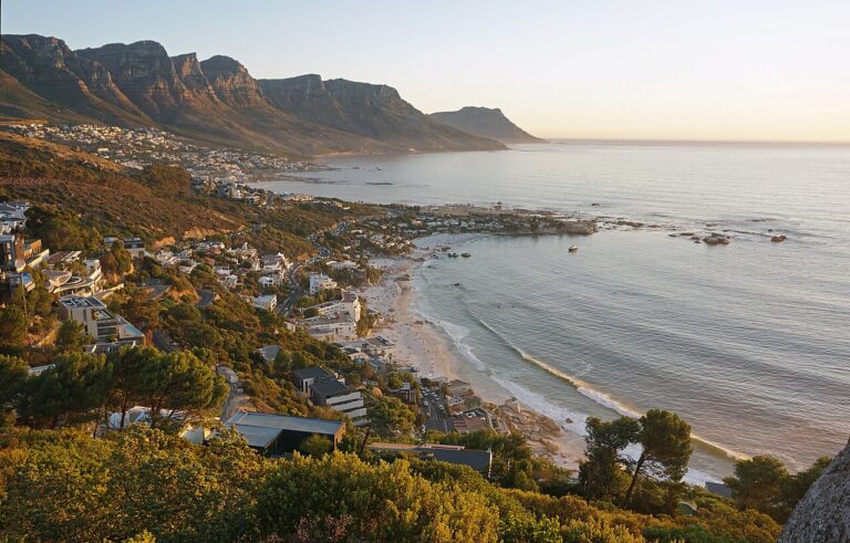 Elevated view over a beach and the Cape Town coastline