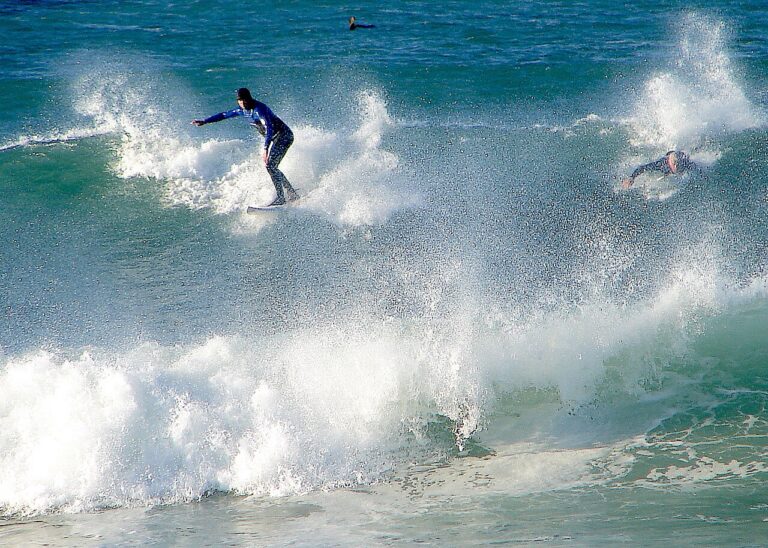 Surfer riding a breaking wave