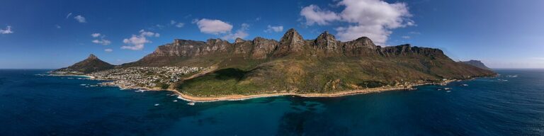 Panoramic view of a mountainous Cape peninsula surrounded by ocean